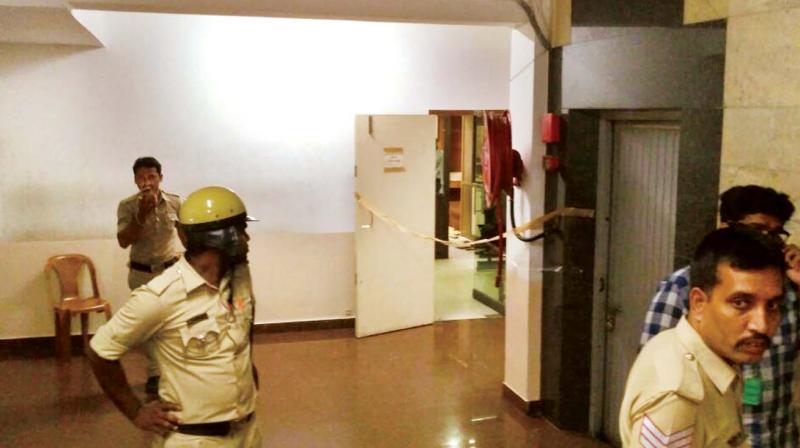 The office of Kanhaiyalal Agarwal (inset) where he survived a shootout in Koramangala on Saturday morning. (Photo: DC)