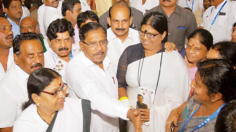 KPCC president Dr G. Parameshwar with office-bearers of the committee during a meeting in Bengaluru on Saturday. (Photo: DC)