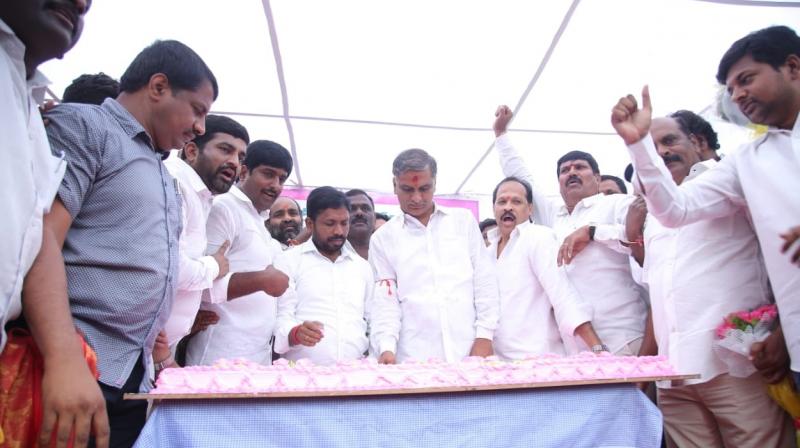 Minister T. Harish Rao cuts a cake brought by his supporters to mark his birthday in Hyderabad. Mr Harish Rao turned 46 on Sunday.