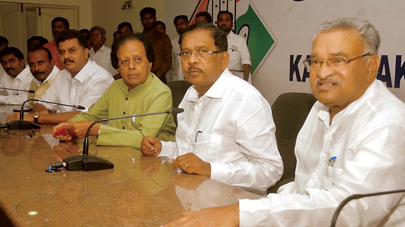 Deputy Chief Minister Dr G. Parameshwar and senior Congress leader B.K. Chandrashekar address the media at the KPCC office on Monday. (Photo: DC)