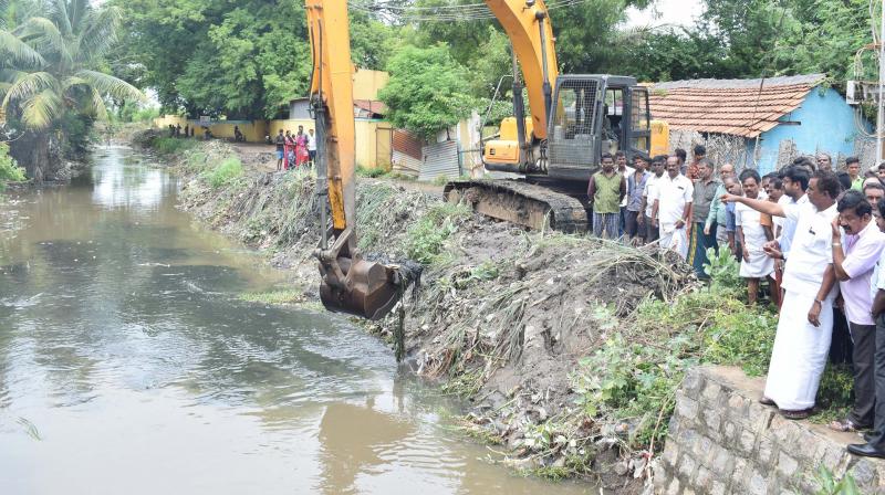 Vellalore pond gets water after 25 years after clearing the encroachments in the approach canal. (Photo: DC)