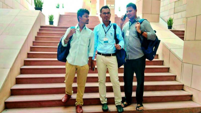Kumra Nikhil, Atram Roshan Kumar and Kunjam Santosh at the ISB, Hyderabad.