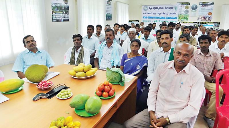 A woman farmer (in blue sari) from Mayaganahalli in Ramanagara district spoke to Prime Minister Narendra Modi as part of his nationwide internaction with farmers on Wednesday.