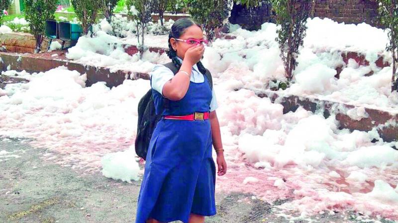 DC reader Clarke Utkarsh S.P. Sharma sents this picture of foam in the Hussainsagar nala spreading on the road near the rear gate of the GHMC head office near Tank Bund on Wednesday.