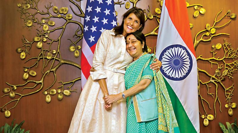 US envoy to UN Nikki Haley hugs external affairs minister Sushma Swaraj, in New Delhi on Wednesday. (Photo: AP)