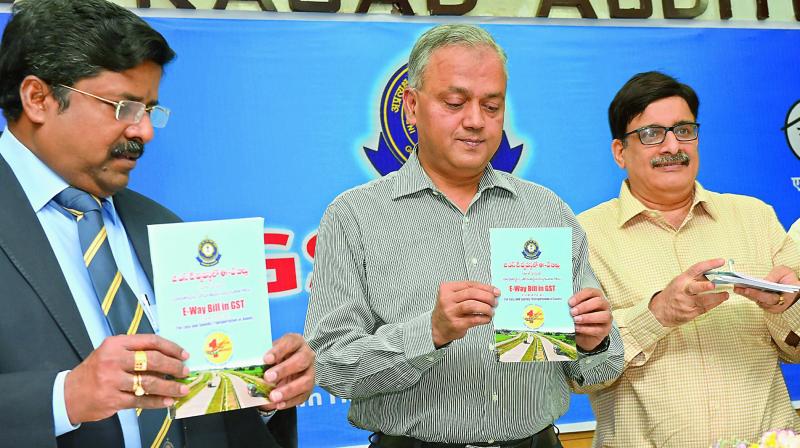 Bankey Behari Agarwal (centre), chief commissioner of customs and central GST at a function organised FTAPCCI in Red Hills on Sunday. (Photo: DC)