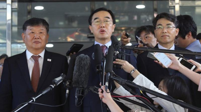 South Korean Unification Minister Cho Myoung-gyon (center) speaks to the media before leaving for the border village of Panmunjom to attend South and North Korean meeting, at the Office of the South Korea-North Korea Dialogue in Seoul, in this June 1, 2018, file photo. (Photo: AP)