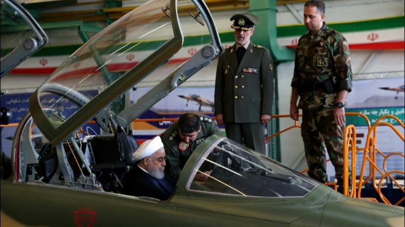 Images on state television showed President Hassan Rouhani sitting in the cockpit of the new Kowsar fourth-generation fighter at the National Defence Industry exhibition in Tehran. (Photo: AFP)