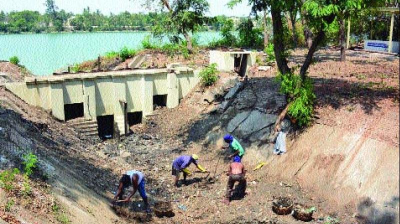 Lake at ICF being cleaned, restored. 	(Photo: DC)