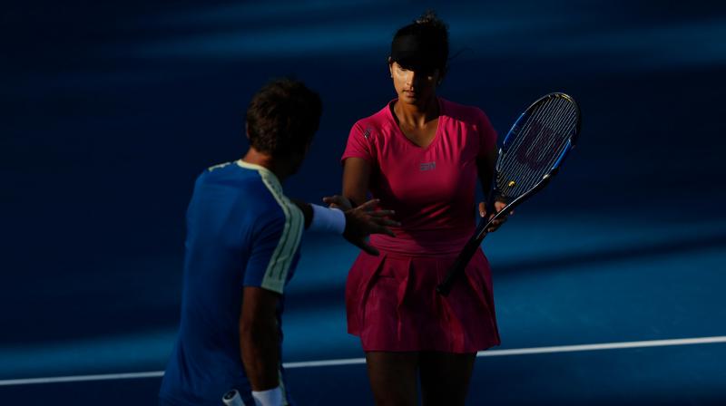 Sania Mirza and Ivan Dodig celebrate a point. (Photo: Australian Open)