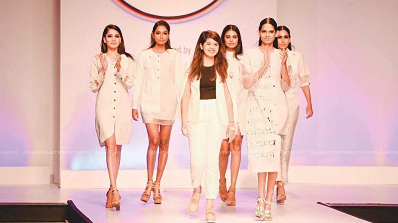 Ayushi with the models at the Colombo Fashion Week 2018.
