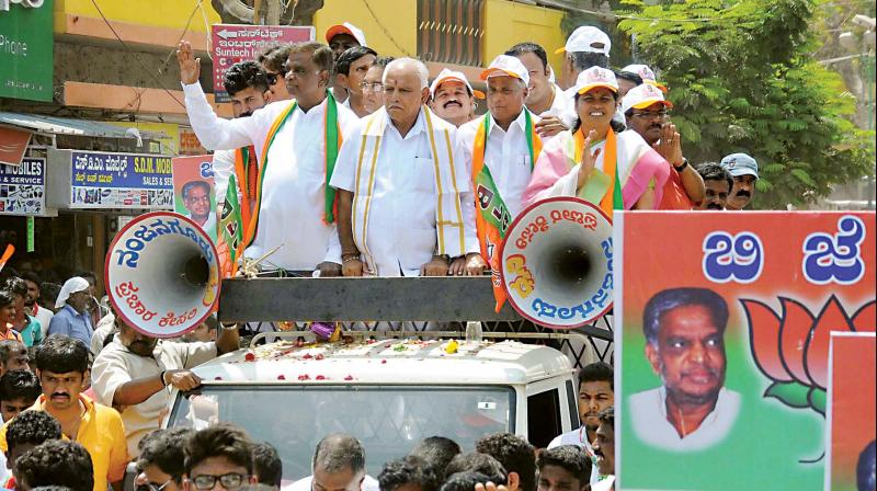 A file photo of BJP candidate for Nanjangud Assembly bypoll V. Srinivasprasad, party leaders B.S. Yeddyurappa, Shobha Karandlaje and V. Somanna  in Nanjangud.(Photo: KPN)