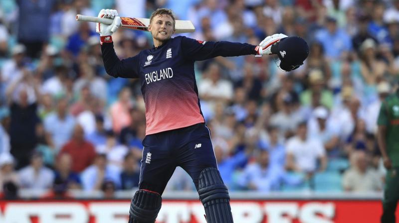 Joe Root celebrates his side beating Bangladesh by eight wickets to win the game during the ICC Champions Trophy cricket match between England and Bangladesh, at the Oval cricket ground, in London (Photo: AP)