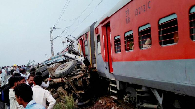 Nine coaches of Azamgarh-Delhi Kaifiat Express train derailed after colliding with a dumper in Auraiya district of Uttar Pradesh on Wednesday. (Photo:PTI)
