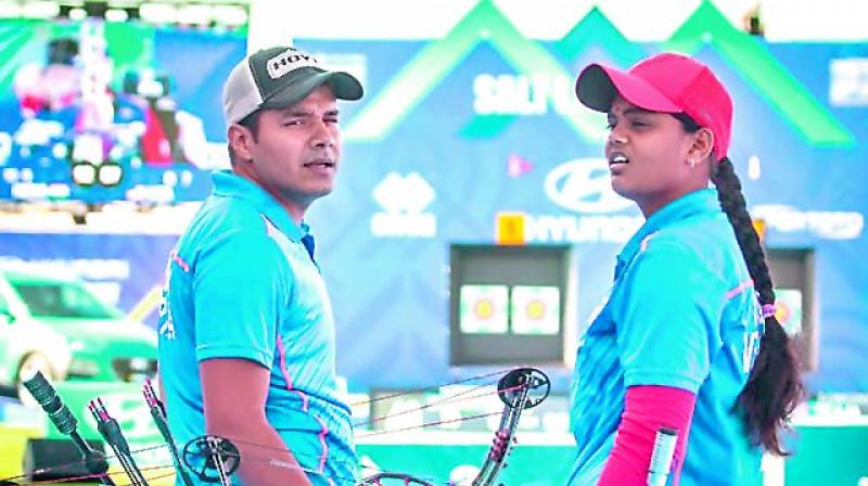 Vennam Jyothi Surekha (right) and Abhishek Verma during the Archery World Cup Stage IV in Berlin.