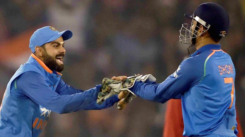 â€œI am not new to captaincy, but there has to be a balance between understanding the skills needed to lead in shorter formats. MS has been helping a lot on that front,\ said Virat Kohli on MS Dhoni. (Photo: PTI)
