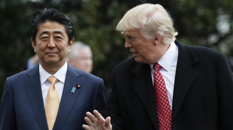 US President Donald Trump with Japanese PM Shinzo Abe. (Photo: AP)