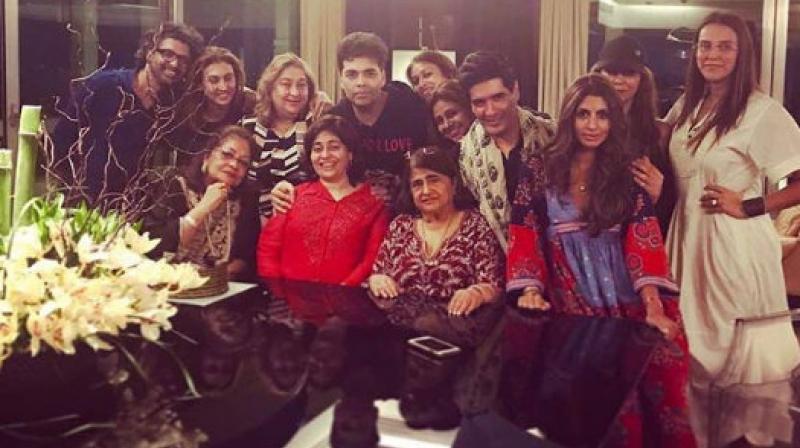 An inside picture of Karan Johar partying with family and friends.