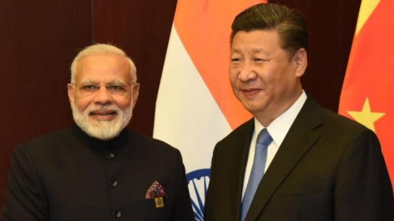 Prime Minister Narendra Modi with Chinese President Xi. (Pic: Twitter/@narendramodi)