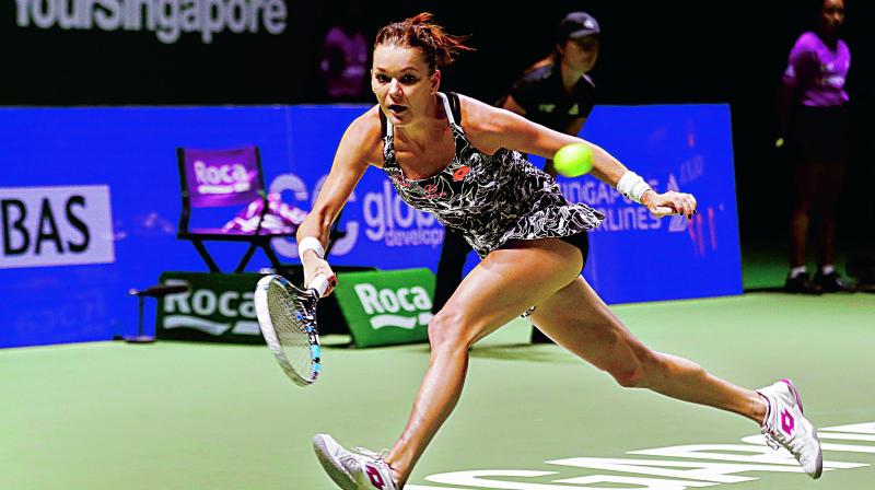 Agnieszka Radwanska of Poland makes a forehand return against Karolina Pliskova of the Czech Republic during their singles match at the WTA tennis tournament on Friday. (Photo: AP)