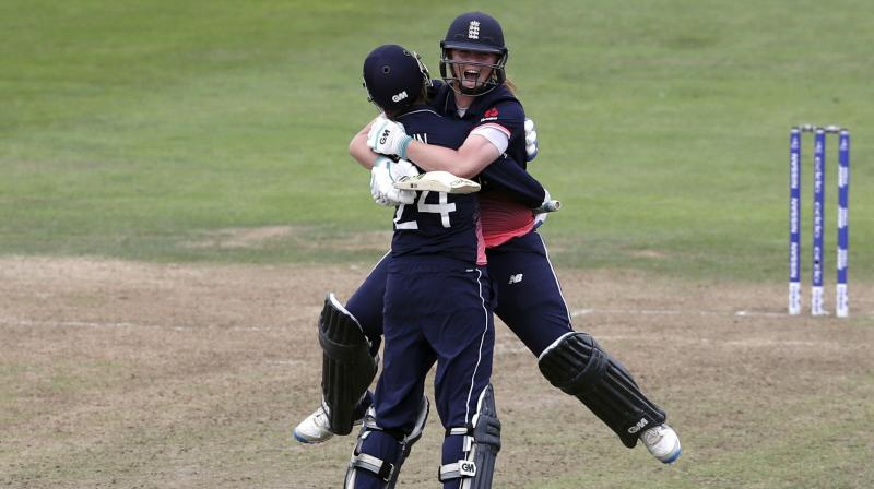 England Anya Shrubsole celebrates hitting the winning runs with teammate Jenny Gunn, during the ICC Womens World Cup semifinal match between England and South Africa. (Photo: AP)
