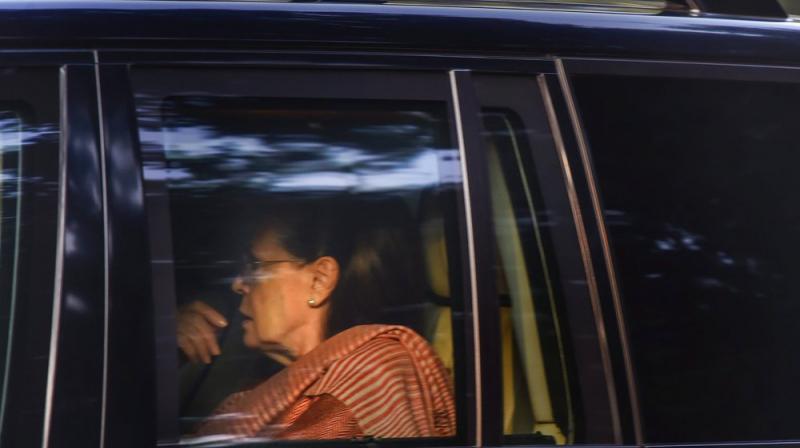 UPA chairperson Sonia Gandhi arrives to meet Congress President Rahul Gandhi at his residence in New Delhi. (Photo: PTI)