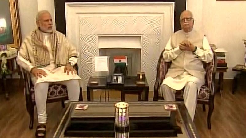 PM Modi meeting LK Advani at his residence. (Photo: ANI Twitter)