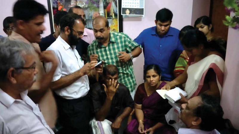 Additional chief secretary, revenue, P.H. Kurian at the house of Kavil Purayidathil  Thomas near Chembanoda in Kozhikode on Saturday. (Photo: DC)