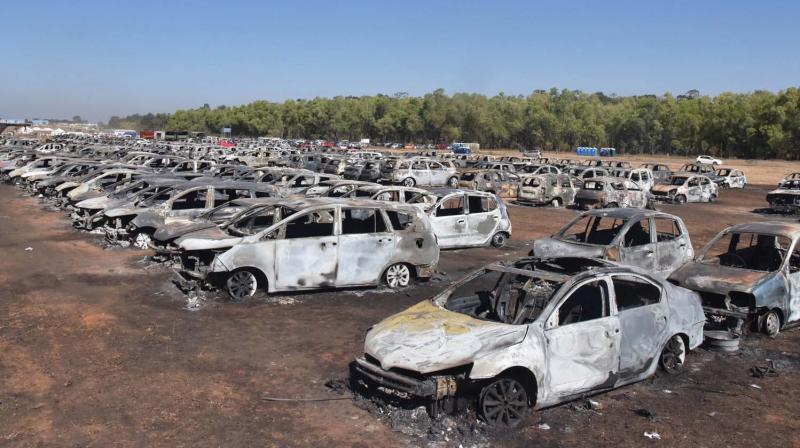 Charred remains of the cars after Saturdays fire