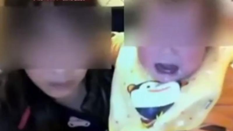 The couple had installed a recording monitor at their home in Fuzhou, which sends live feed related to their childs activities. (Photo: Screengrab)