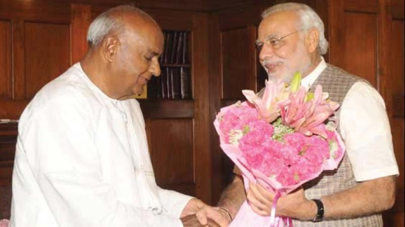 Former PM Deve Gowda with PM Narendra Modi in a file photograph