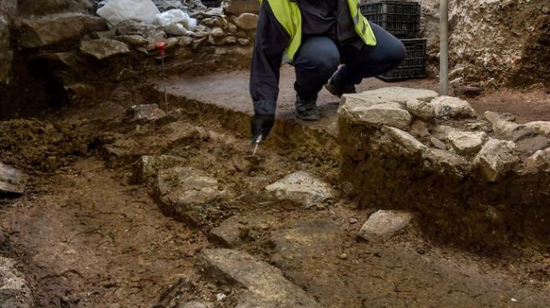 Hundreds of years after the barrow was built, someone from the 12th or 13th century came back to this site and dug into it to bury this pot (Photo: AFP)