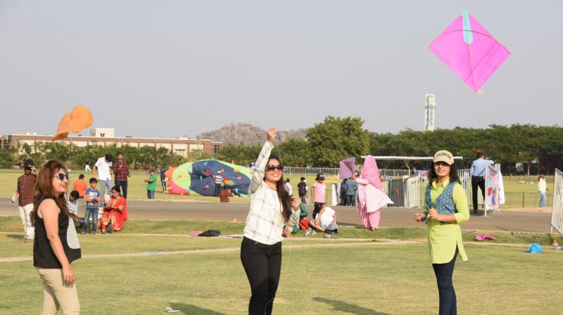 A file photo of women flying kites.