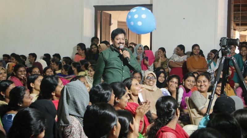 Magician Gopinath Muthukad performs at  My Kerala - Mentoring young Kerala ,  jointly organised by Kerala State Youth Commission and Magic Academy at Malabar Chiristian College, Kozhikode on Wednesday.(Photo: Venugopal)