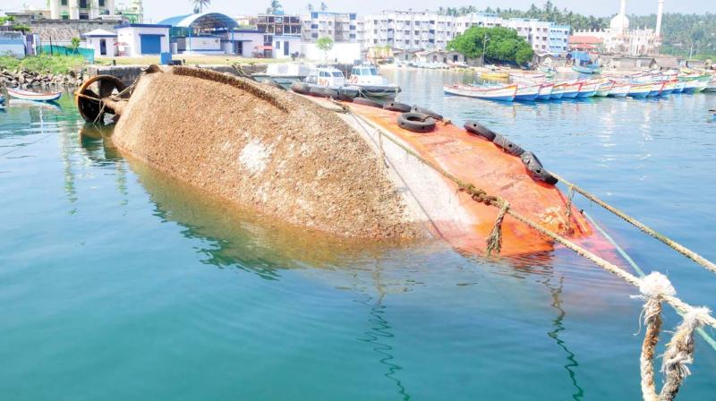 MV Brahmekshara, the abandoned tugboat, which sank spilling fuel and oil at Seaward Wharf of Vizhinjam Port on Wednesday. (Photo: A.V.MUZAFAR )