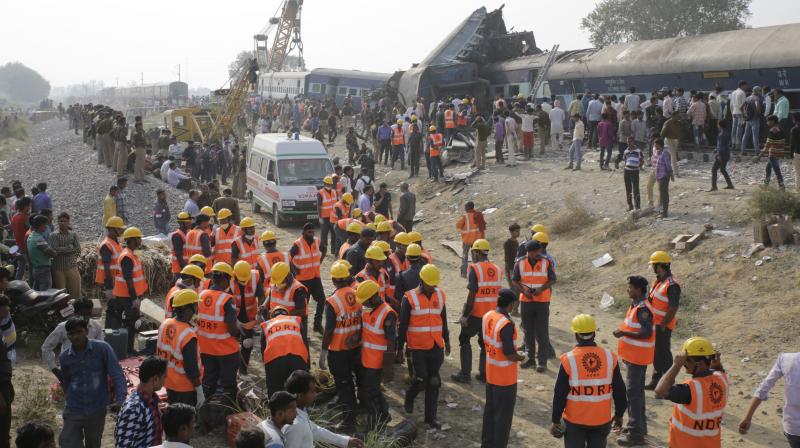 Rescuers work on the site of a train derailment accident in Kanpur Dehat, India, Sunday, Nov. 20, 2016. Many were killed Sunday when 14 coaches of an overnight passenger train rolled off the track. (Photo: AP)