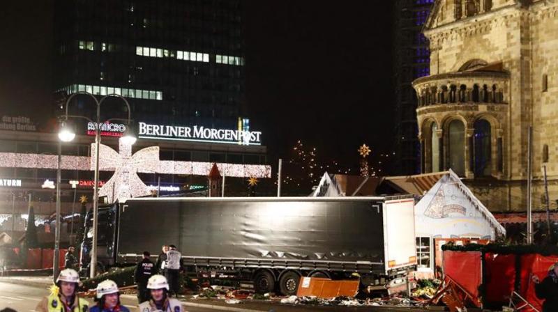 Police and firefighters work around the truck that crashed into a Christmas market at GedÃ¤chniskirche church in Berlin. (Photo: AFP)