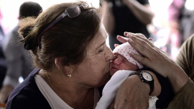 Nonpharmacological pain relief is often used with infants during minor painful procedures like heel sticks (Photo: AFP)