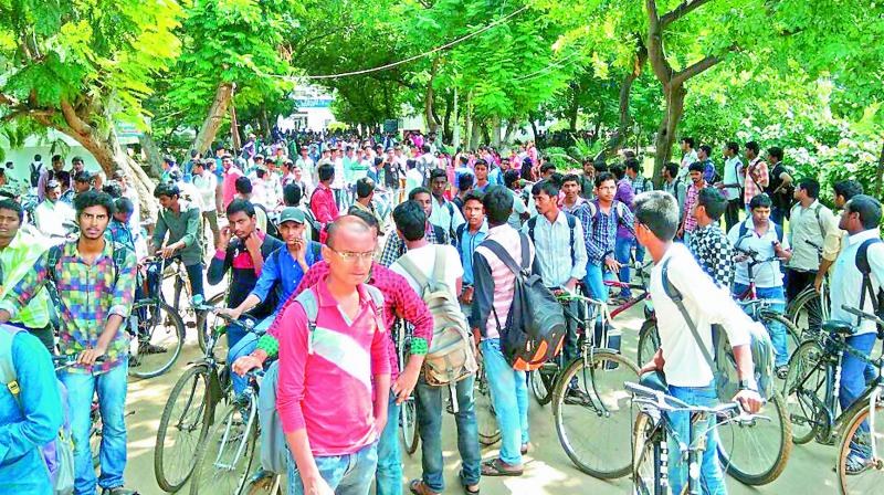 Students leave their college as leaders of various student unions call for bandh of educational institutions in Guntur on Thursday. (Photo: DC)