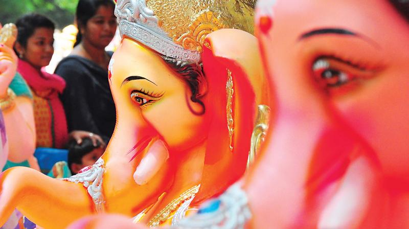 Ganesha idols made of Plaster of Paris on display in Bengaluru on Wednesday. (Photo: Satish B.)