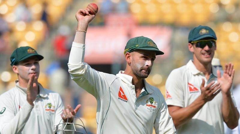 Nathan Lyon was advised by his personal coach John Davison not to pay too much attention to the hat-trick ball. (Photo: AFP)