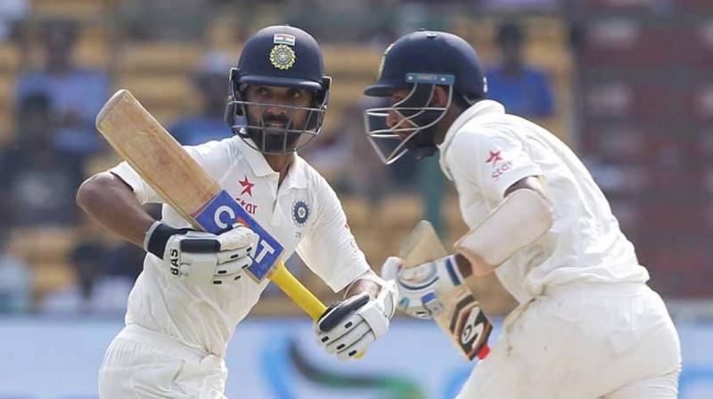 Cheteshwar Pujara showed admirable temperament and was helped by flamboyant opener Lokesh Rahuls second half-century of the match. (Photo: BCCI)