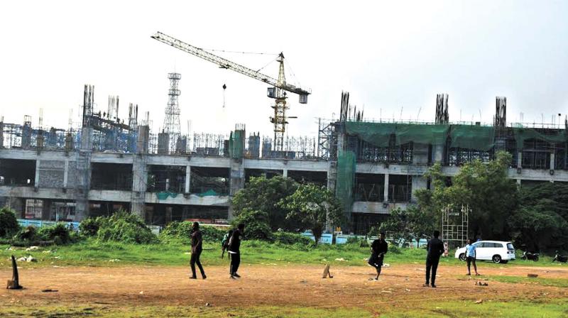 Works progressing at Kaloor stadium metro station, Kochi on Wednesday. (Photo: DC)