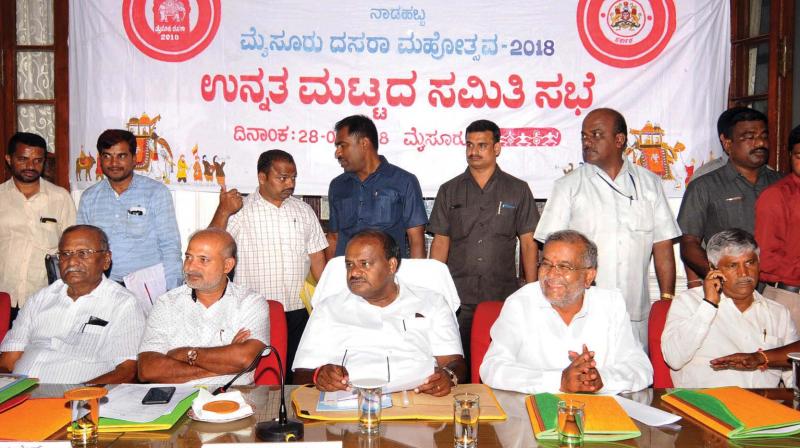 Chief Minister H.D. Kumaraswamy and ministers G.T. Devegowda, C.S. Puttaraju, Jayamala and other dignitaries at the high-level Dasara committee meeting in Mysuru on Tuesday (Photo: KPN)