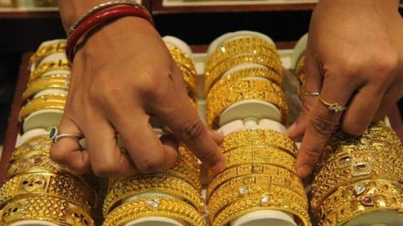 Globally, gold rose by 0.49 per cent to USD 1,201.20 an ounce and silver by 0.70 per cent to USD 17.20 an ounce in Singapore.