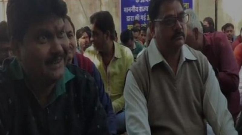 Electricity board employees protesting against Ashok Chandna in Bundi. (Photo: ANI)