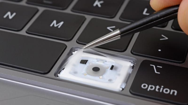 Three class action suits have been filed against Apple over the keyboard design defects. (Image: iFixit Org)