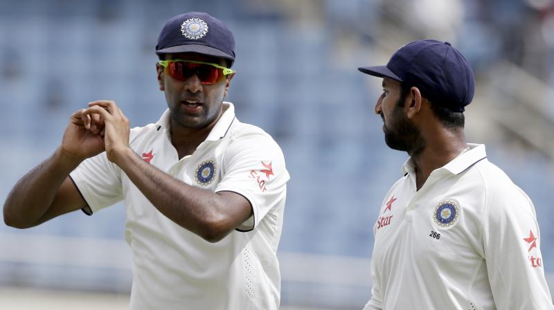 Cheteshwar Pujara has thrown his weight behind star spinner Ravi Ashwin, saying he has made changes he believes will help him finally enjoy success in Australia in the four-test series starting in Adelaide. (Photo: AP)