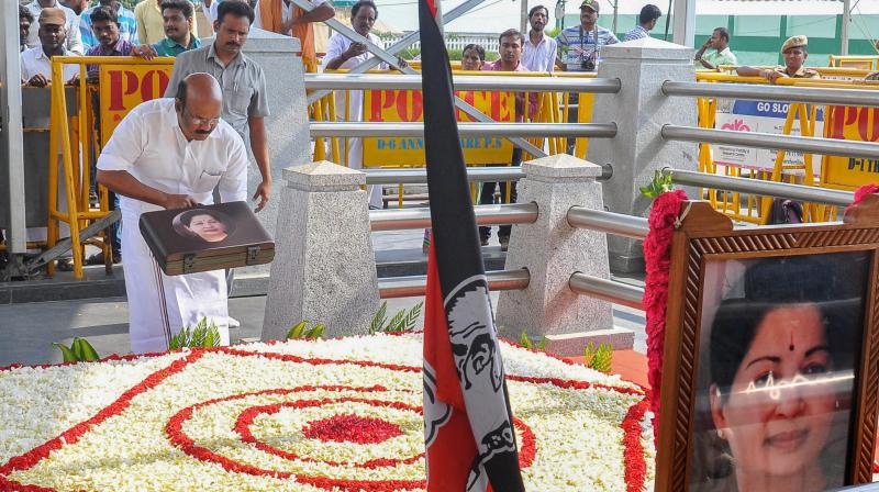 Tamil Nadu Finance Minister D Jayakumar paying respects at the memorial of the late AIADMK Supremo J Jayalalithaa prior to presenting his first budget for the financial year 2017-18 in Chennai. (Photo: PTI)