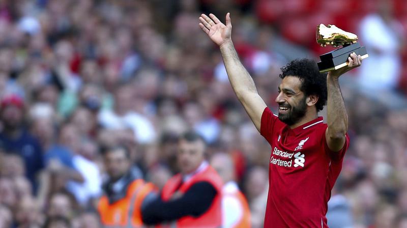 Mohamed Salah moved onto 32 goals for the season  a  record for a 38-game Premier League  and ensured Harry Kane would not be claiming the Golden Boot for a third straight year. Kane finished on 30 goals. (Photo: AP)